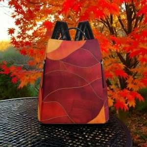 Anti-Theft Backpack, Travel Daypack in synthetic leather / Orange-Red